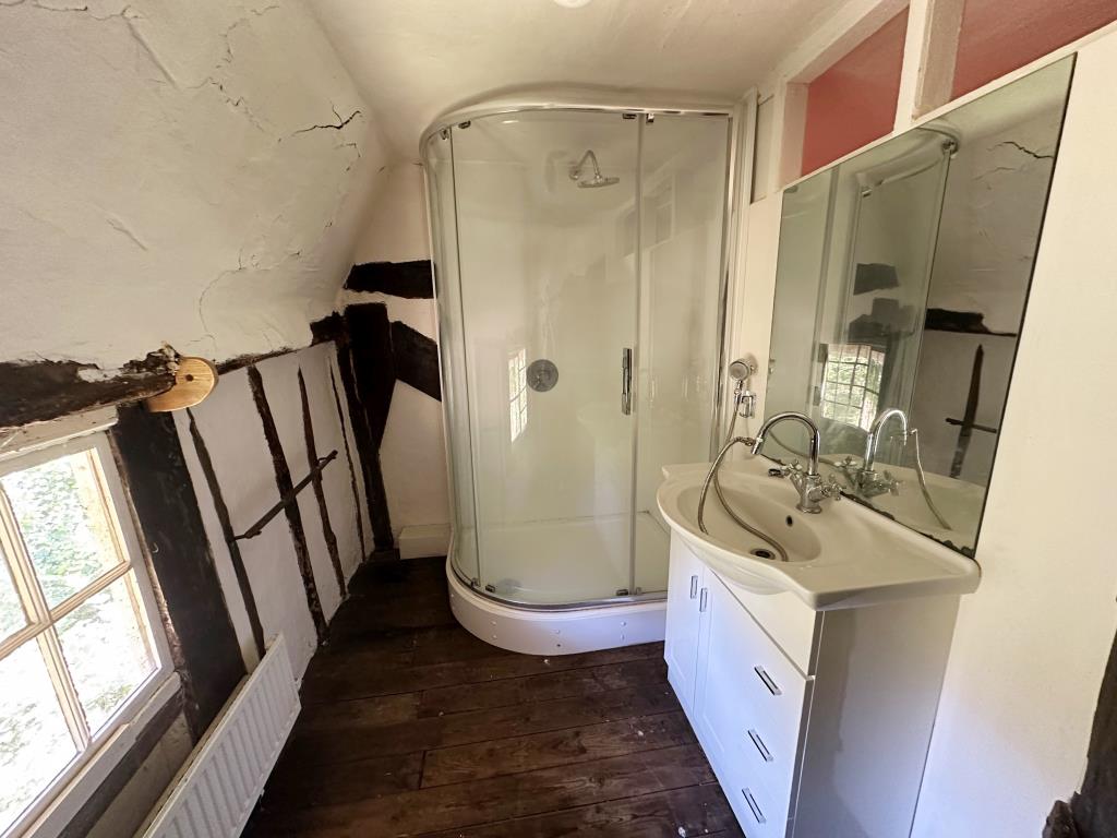 Lot: 115 - DETACHED THATCHED COTTAGE IN NEED OF REPAIR ON 1.36 ACRES OF LAND - Shower room with shower and basin